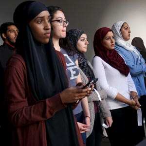 Muslim Girl Sitting With A Group Of Activists, 46% OFF