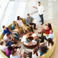 Group of people at work discussing their strengths