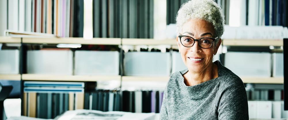 Woman wearing glasses smiling