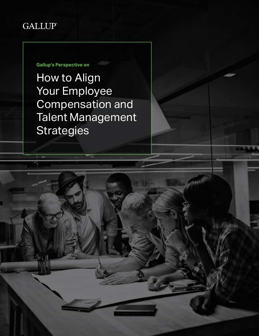 Report cover for Gallup’s Perspective on How to Align Your Employee Compensation and Talent Management Strategies, featuring a manager working on a project with his team